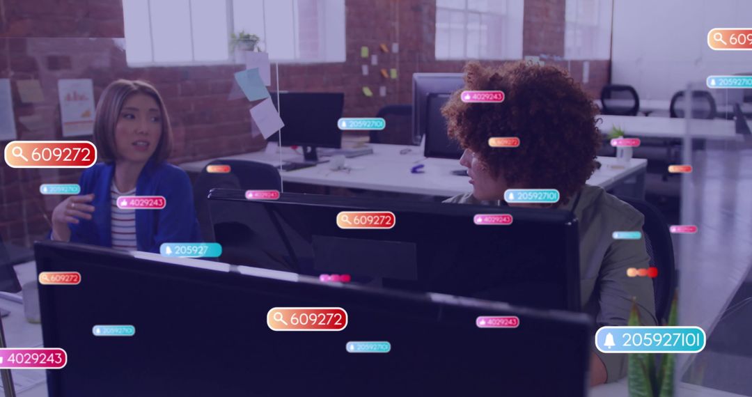 Diverse Colleagues Discuss Social Media Strategies in Modern Office