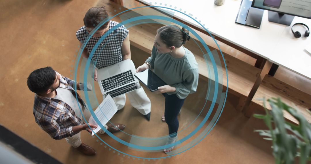 Are Professional Team Engaging in Modern Workspace with Digital Interface