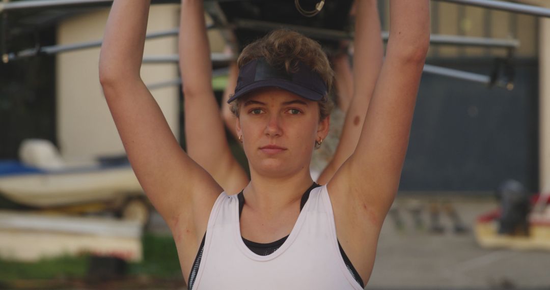 Female Rower Preparing Equipment for Practice - Free Images, Stock Photos and Pictures on Pikwizard.com