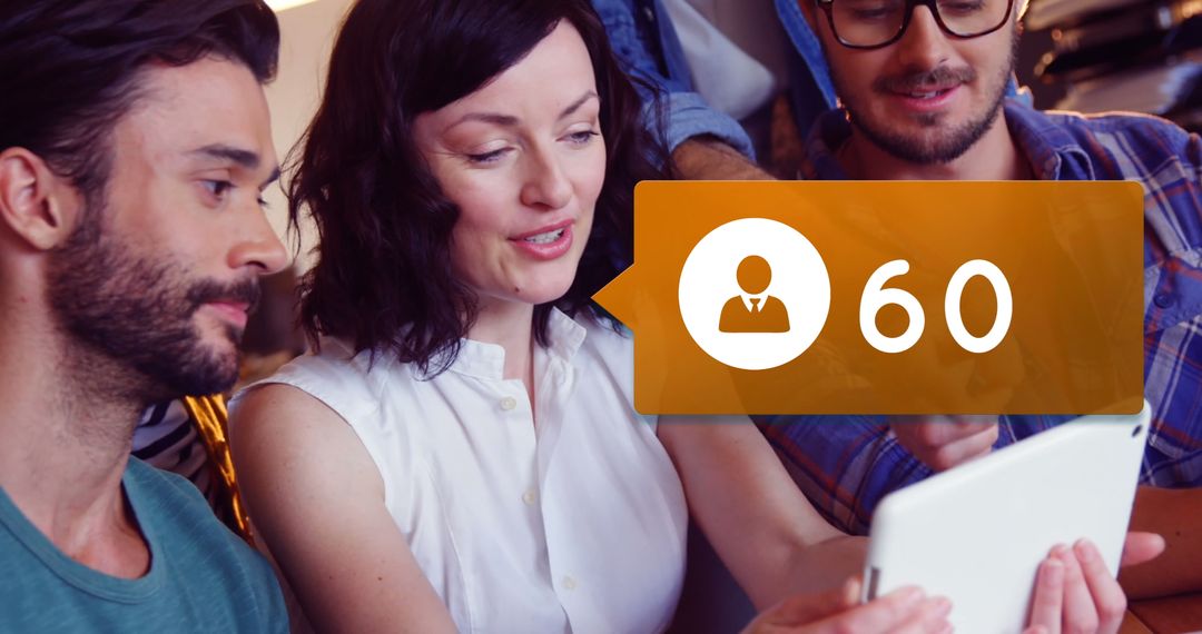 Group Colleagues Increasing Followers Using Tablet