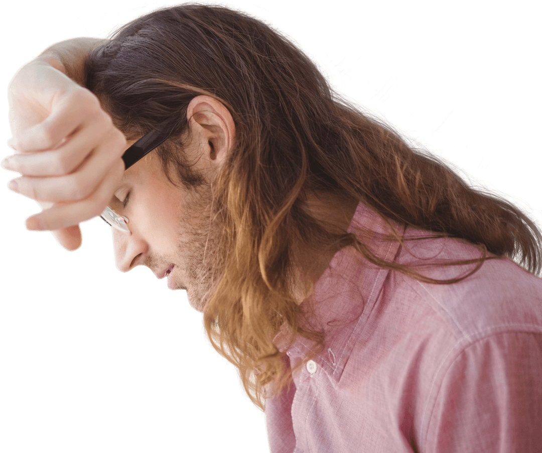 Hipster reflecting with sympathetic expression in transparent office