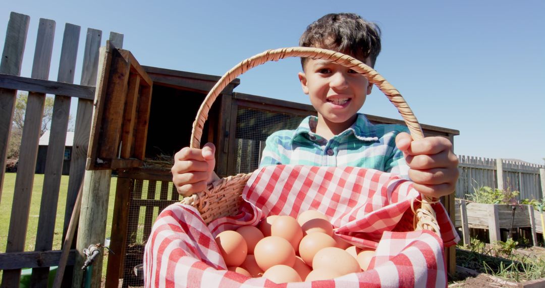 Smiling Child Holding Basket Filled with Fresh Eggs in Farm - Free Images, Stock Photos and Pictures on Pikwizard.com