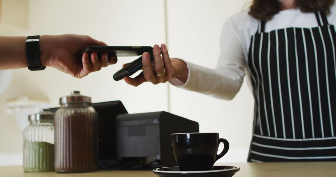 Customer Making Contactless Payment at Coffee Shop with Smartphone - Free Images, Stock Photos and Pictures on Pikwizard.com