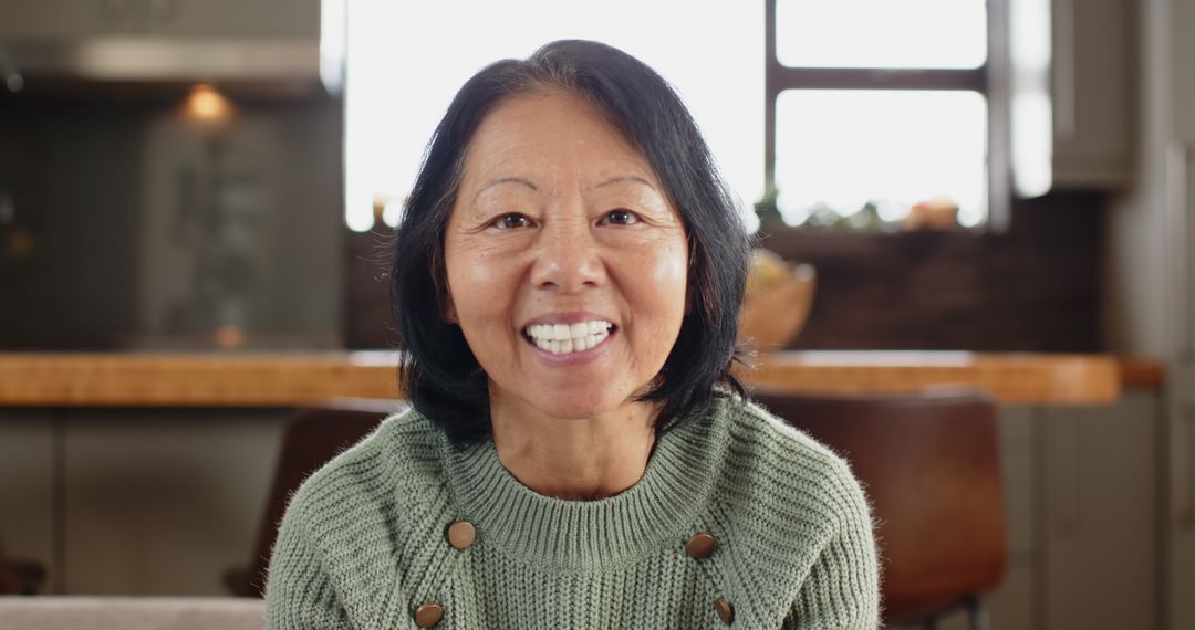 Senior Woman Relaxing at Home Smiling Warmly