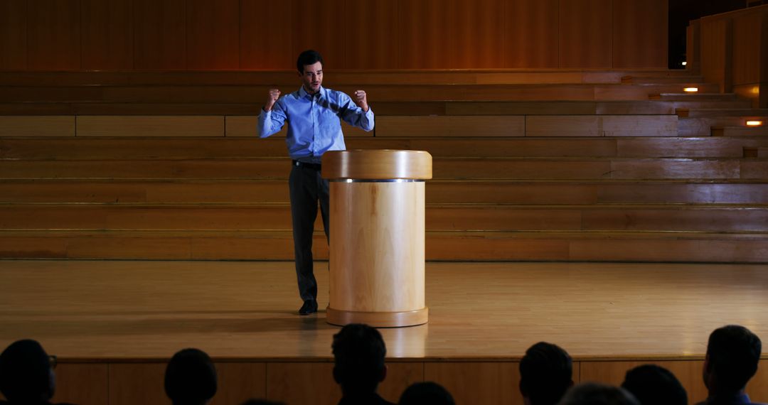 Motivational Speaker Addressing Audience in Conference Hall - Free Images, Stock Photos and Pictures on Pikwizard.com