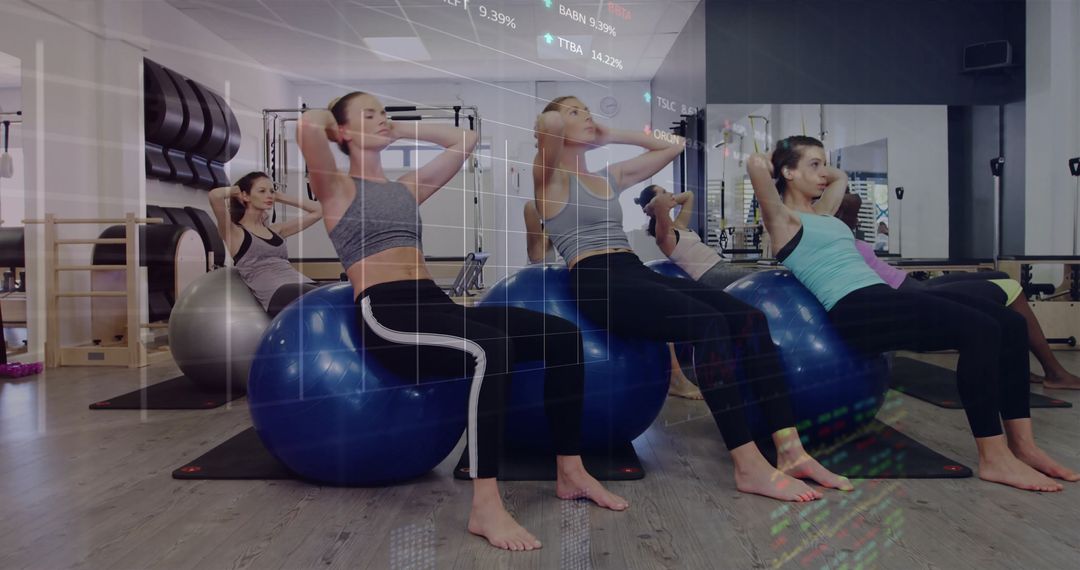 Group Exercise Class with Stability Balls in Fitness Studio