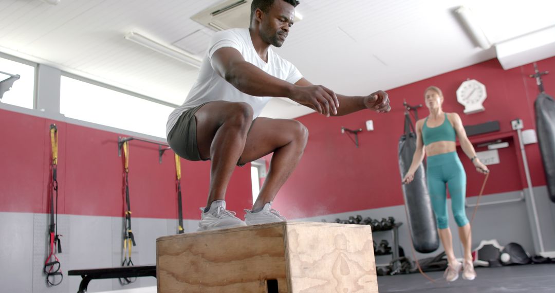 Dynamic Individuals Engaged in Diverse Gym Training Exercises