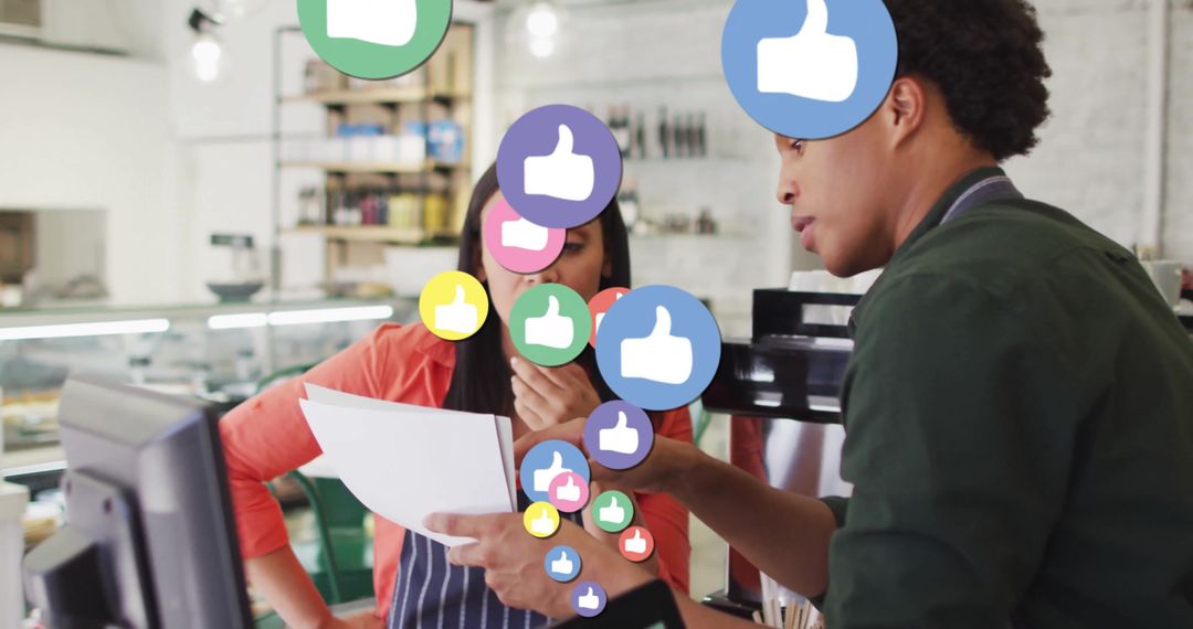 Cafe Staff Discussing Plans with Digital Thumbs-Up Overlay
