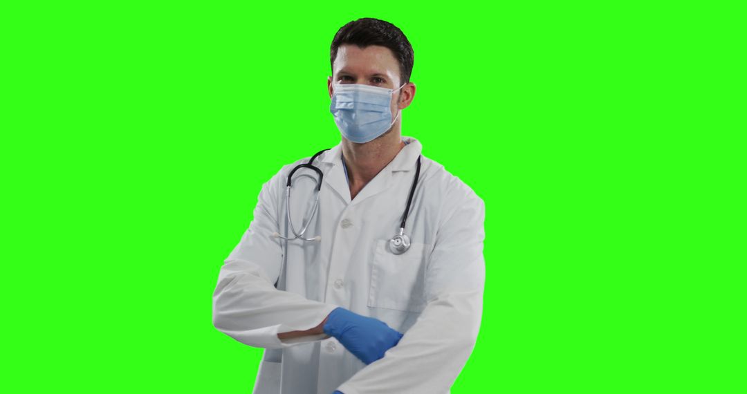 Confident Male Doctor Adjusting Sleeve with Stethoscope Wearing Face Mask on Green Screen - Free Images, Stock Photos and Pictures on Pikwizard.com