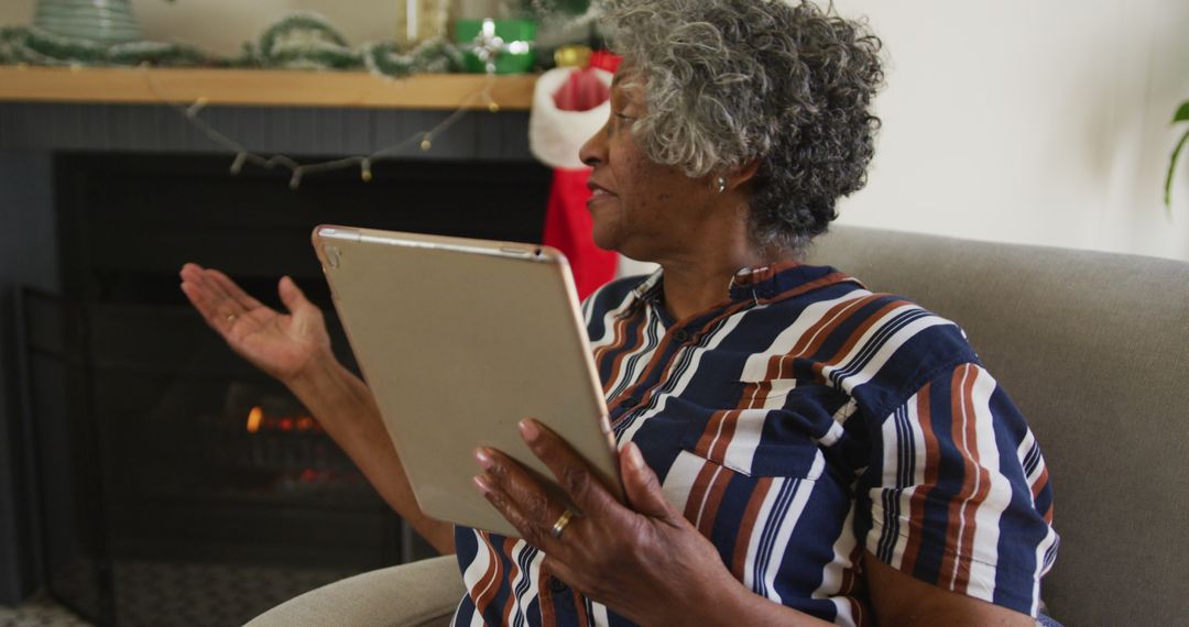 Senior Black Woman Video Calling Family During Christmas Holiday - Free Images, Stock Photos and Pictures on Pikwizard.com