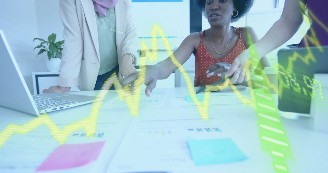 Diverse Business Team Collaborating with Financial Analytics