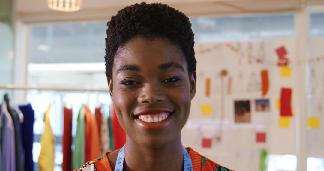 Confident Young African American Fashion Designer Smiling in Studio - Free Images, Stock Photos and Pictures on Pikwizard.com