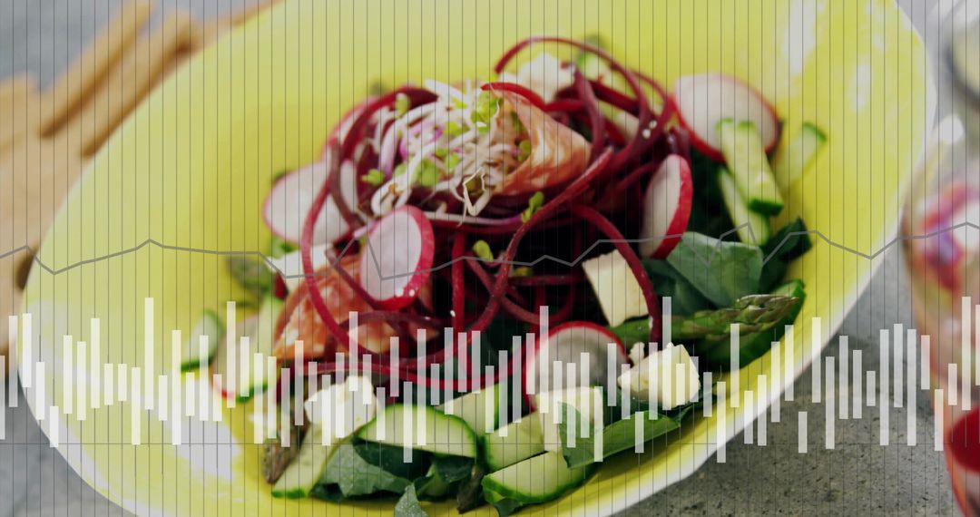 Yellow Bowl Salad with Spiral Beet Ribbons, Smoked Salmon, Feta and Audio Waveform Overlay