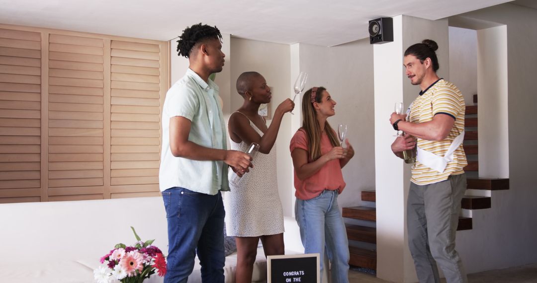 Friends Celebrating Success with Champagne Toast at Home