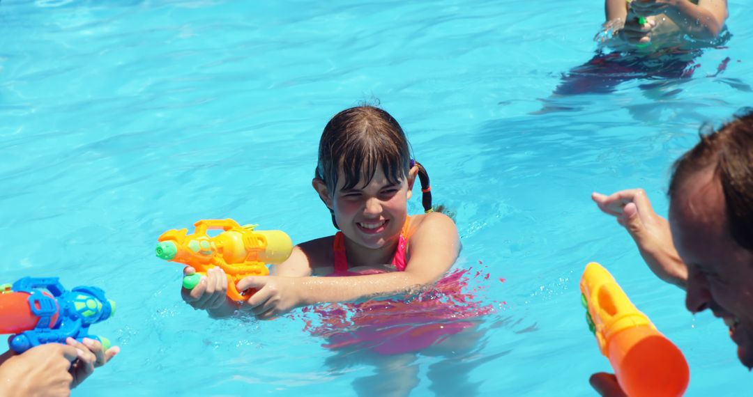 Children Playing in Pool with Water Guns on Sunny Day - Free Images, Stock Photos and Pictures on Pikwizard.com