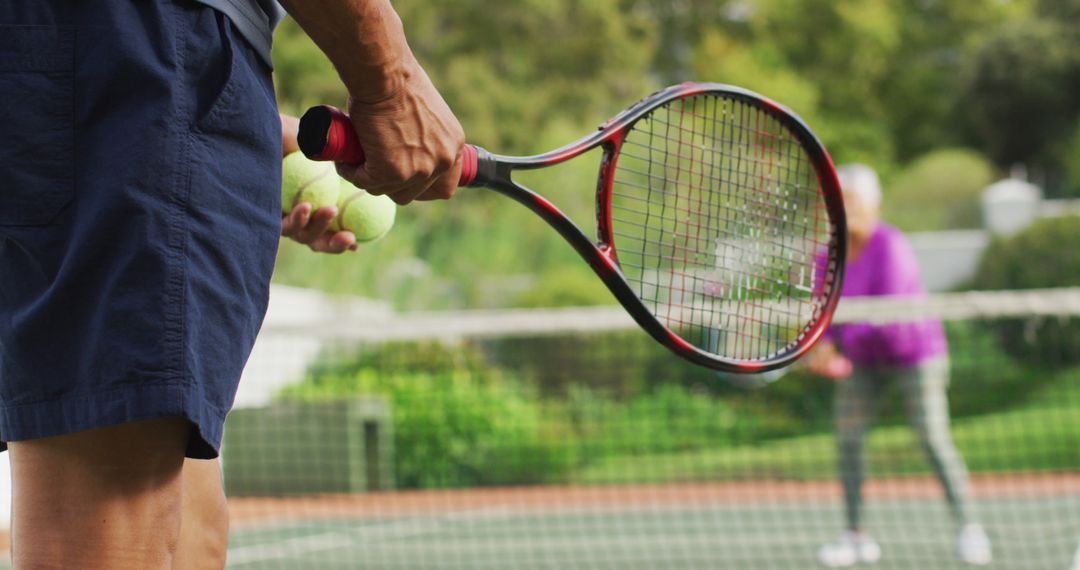 Men Playing Tennis Outdoors on Sunny Day - Free Images, Stock Photos and Pictures on Pikwizard.com