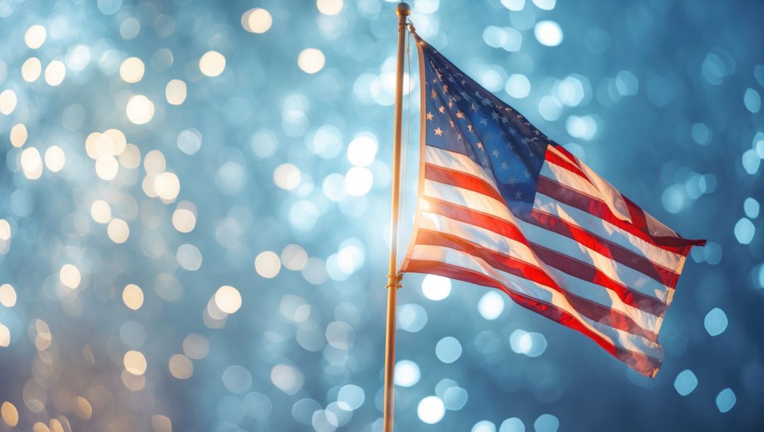 American Flag Fluttering with Festive Bokeh Lights