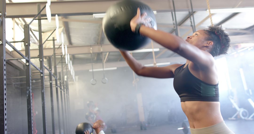 Woman Exercising with Medicine Ball in Gym - Free Images, Stock Photos and Pictures on Pikwizard.com