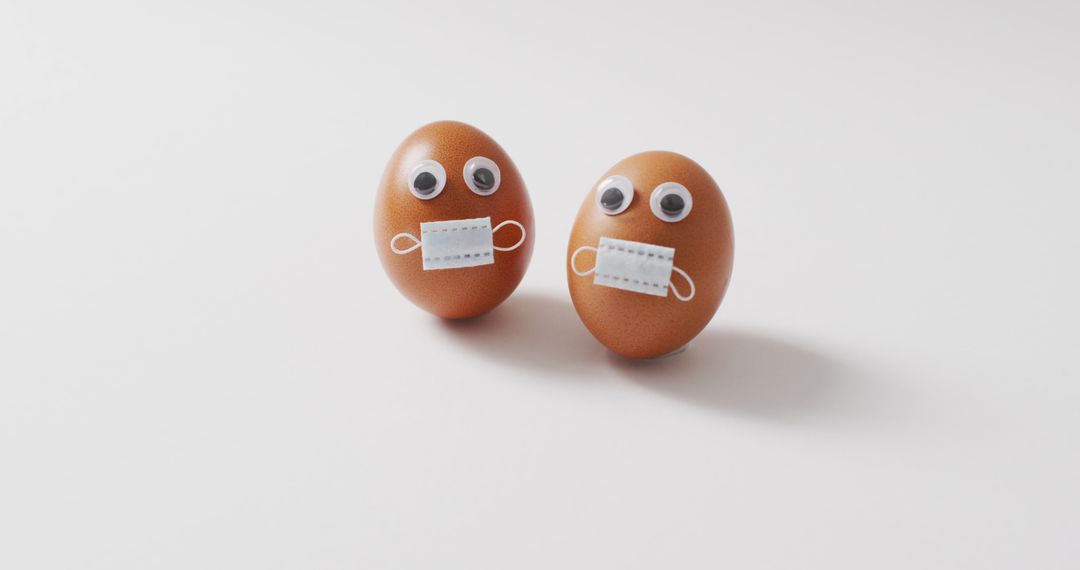 Funny Eggs with Googly Eyes and Masks Symbolizing Pandemic - Free Images, Stock Photos and Pictures on Pikwizard.com