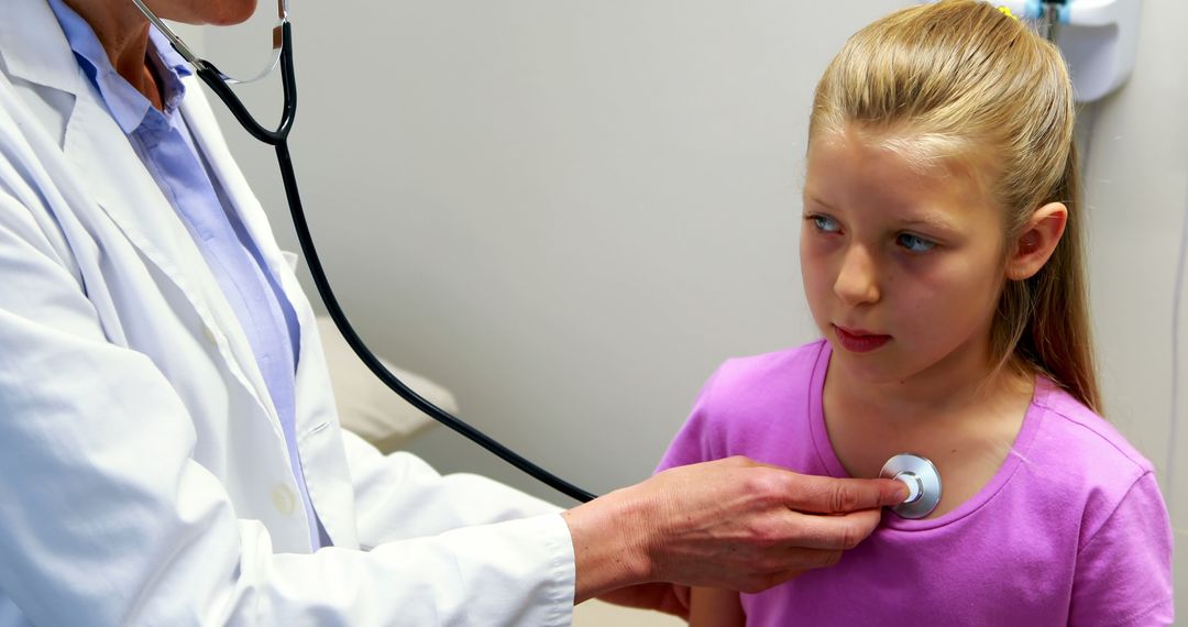 Pediatrician Listening to Girl's Heartbeat with Stethoscope - Free Images, Stock Photos and Pictures on Pikwizard.com