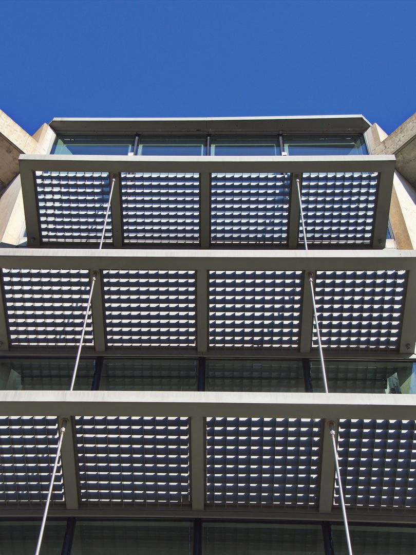 Modernled Solar Panel Grid with Blue Sky Background