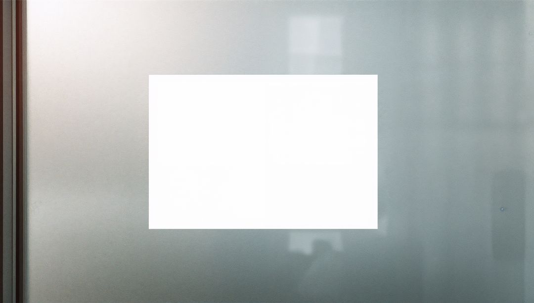 Minimalist Blank Display Panel on Frosted Glass Surface