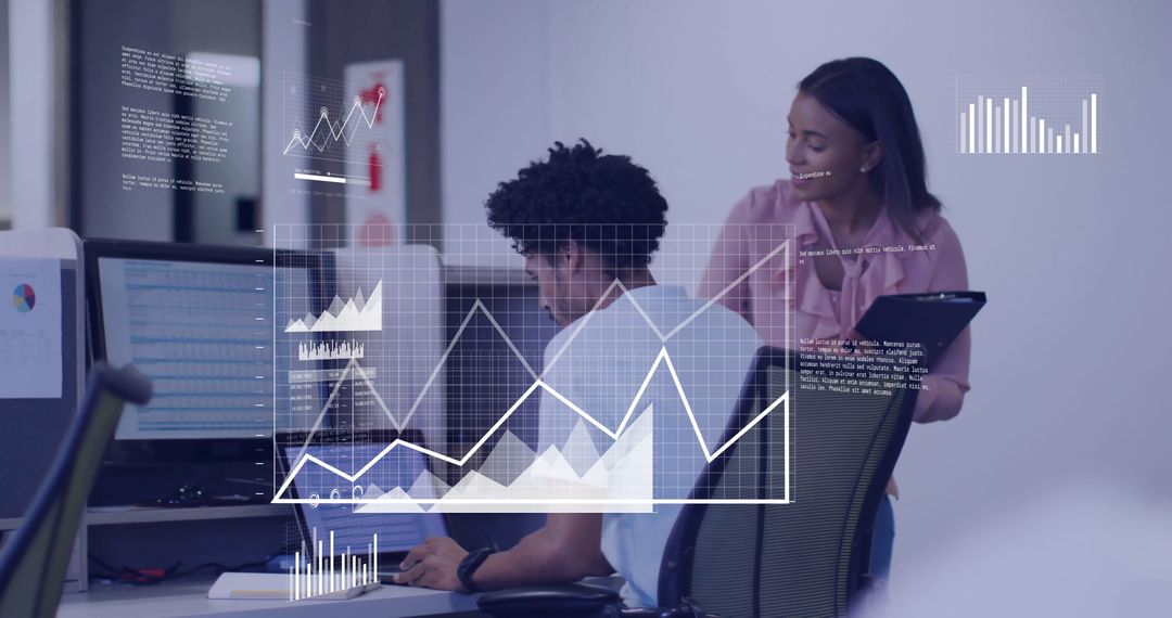 Co-Workers Analyzing Data with Digital Interface in Modern Office