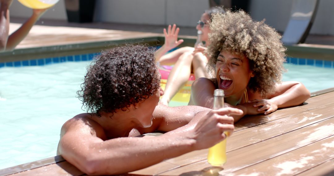 Diverse Friends Enjoying Relaxing Summer Pool Day with Drinks