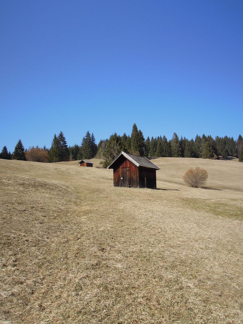 Old Wooden Barn on Grassy Hill under Clear Blue Sky - Free Images, Stock Photos and Pictures on Pikwizard.com