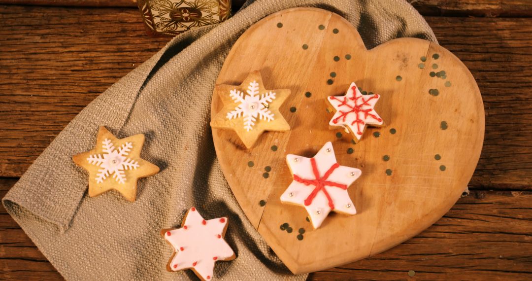 Christmas gingerbread cookies on wooden table 4k - Free Images, Stock Photos and Pictures on Pikwizard.com