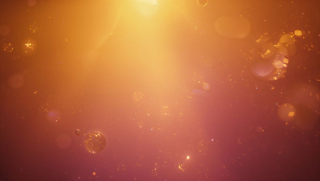 Ambient Luminous Particles in Warm Amber Glowing Light