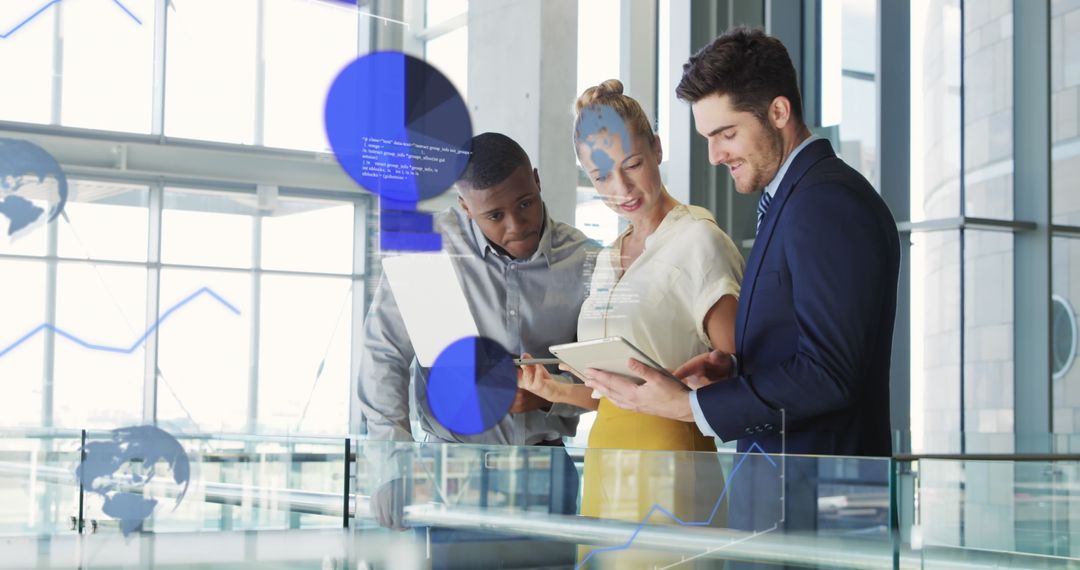 Colleagues Analyzing Digital Financial Data in Modern Office