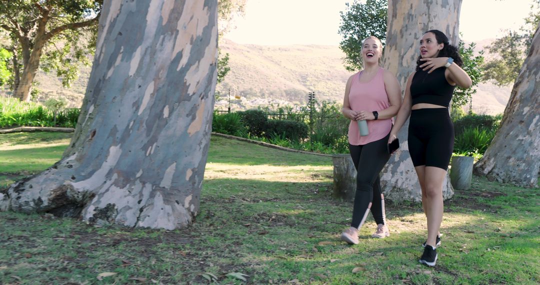 Diverse Friends Enjoying Walk in Urban Park