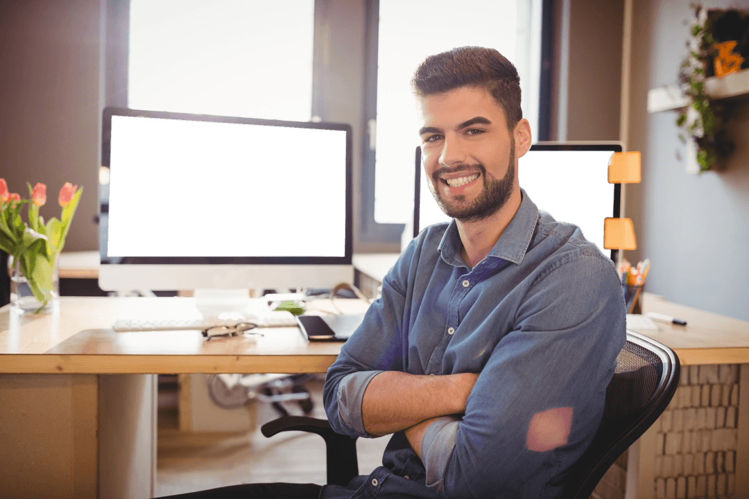 Confident Male Graphic Designer in Office Space with Transparent Monitors