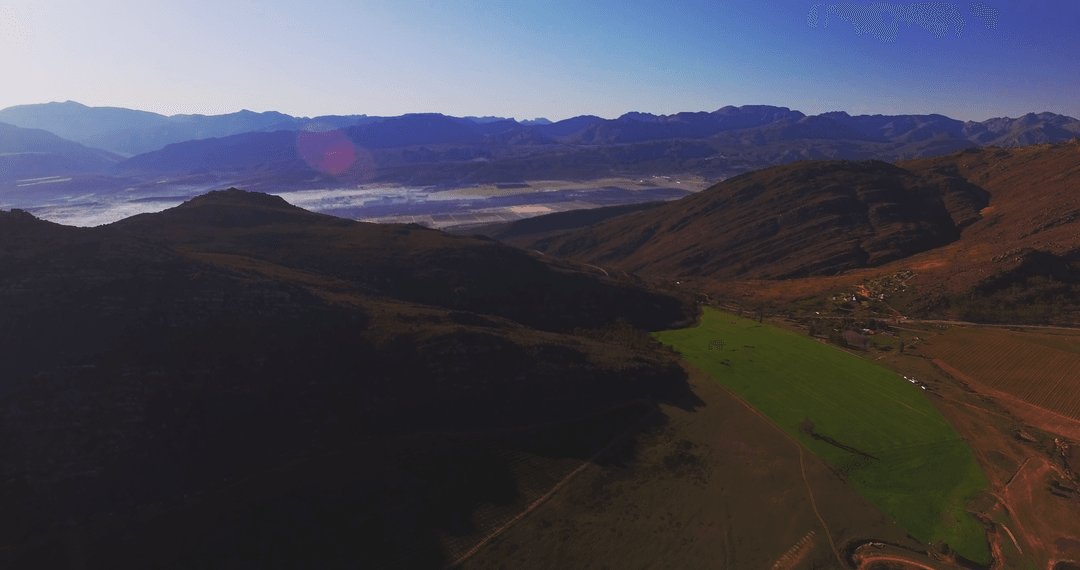 Transparent Morning Light on Verdant Mountain Range Scenery