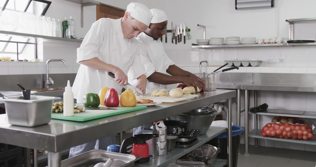 Chefs Preparing Fresh Vegetables in Modern Commercial Kitchen - Free Images, Stock Photos and Pictures on Pikwizard.com