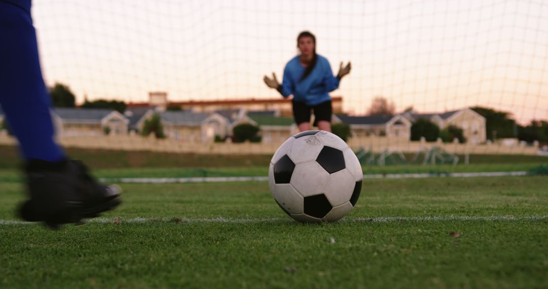 Soccer Player Taking Penalty Shot on Grass Field - Free Images, Stock Photos and Pictures on Pikwizard.com