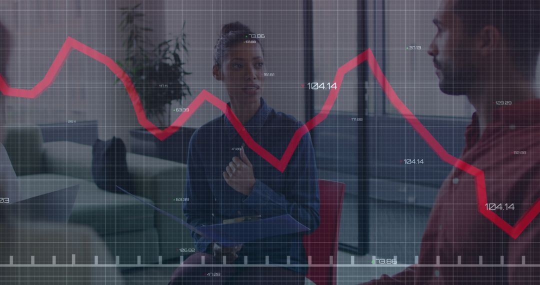 Business Professionals Analyzing Financial Data with Line Graph Overlay - Free Images, Stock Photos and Pictures on Pikwizard.com