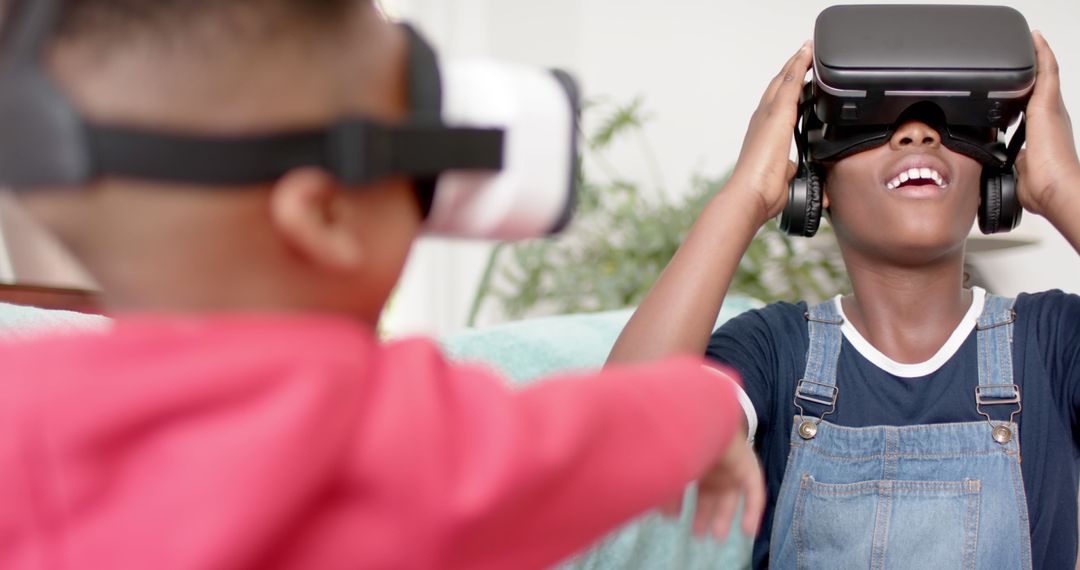 Children Experiencing Virtual Reality with VR Headsets at Home - Free Images, Stock Photos and Pictures on Pikwizard.com