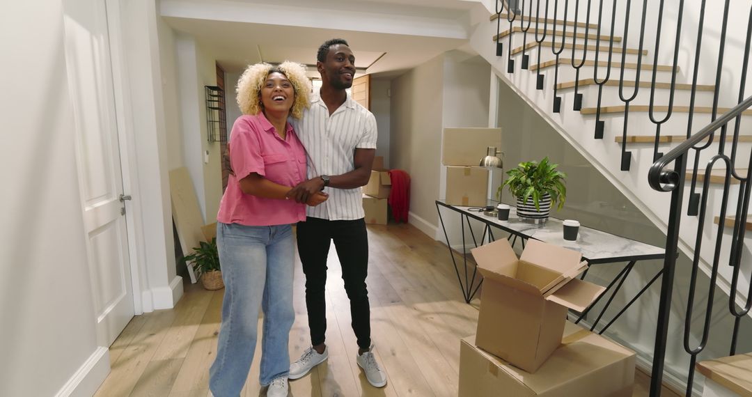 Friends Celebrating New Home Arrival with Hugs and Smiles