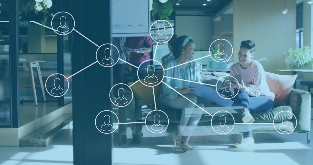 Young professionals collaborating in modern coworking lounge with digital network overlay