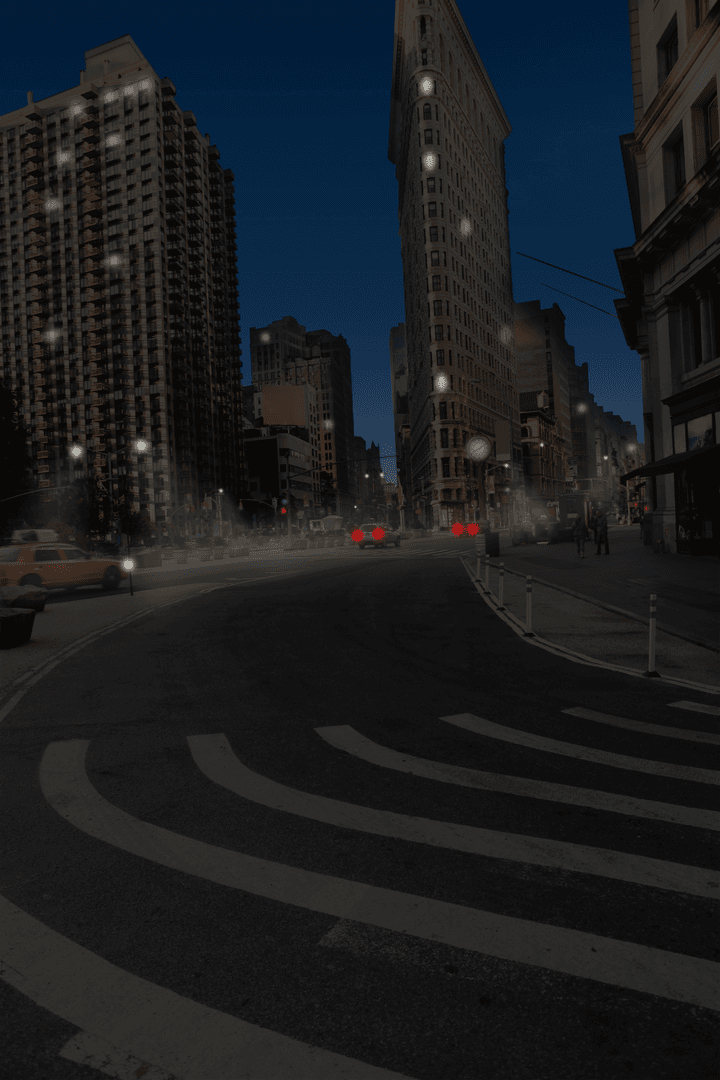 Transparent Nighttime Cityscape with Iconic Flatiron Architecture