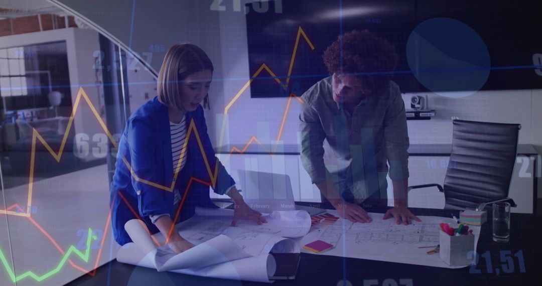 Business Professionals Analyzing Blueprints in Technologically Advanced Office