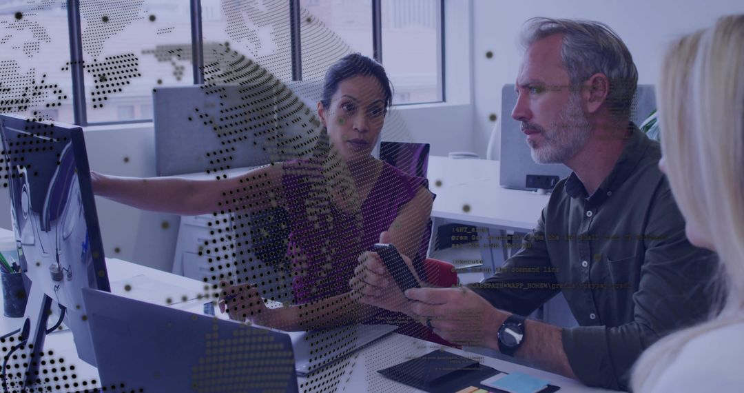 Office team collaborating on data analytics and mobile devices in open-plan workspace