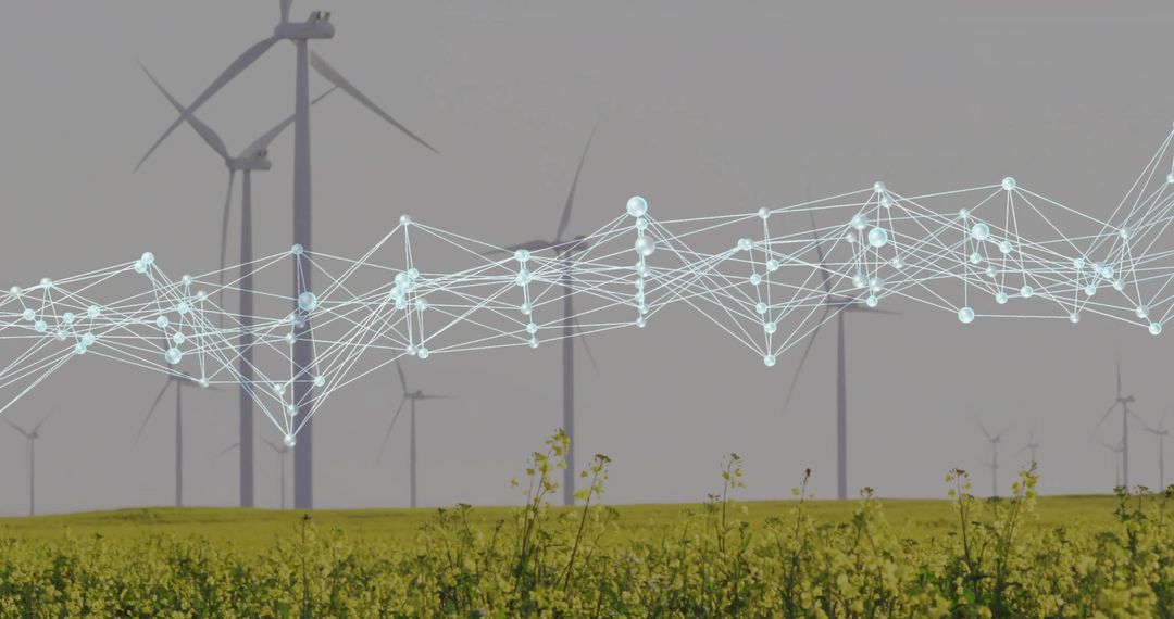 Wind Turbines with Digital Network Overlay in Yellow Crop Field