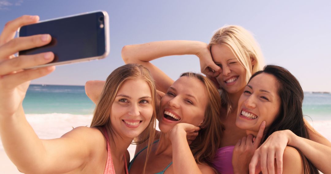 Friends Smiling Taking Selfie on Beach Vacation - Free Images, Stock Photos and Pictures on Pikwizard.com