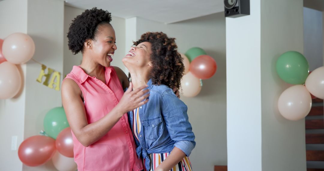 Joyful Embrace During a Festive Celebration at Home