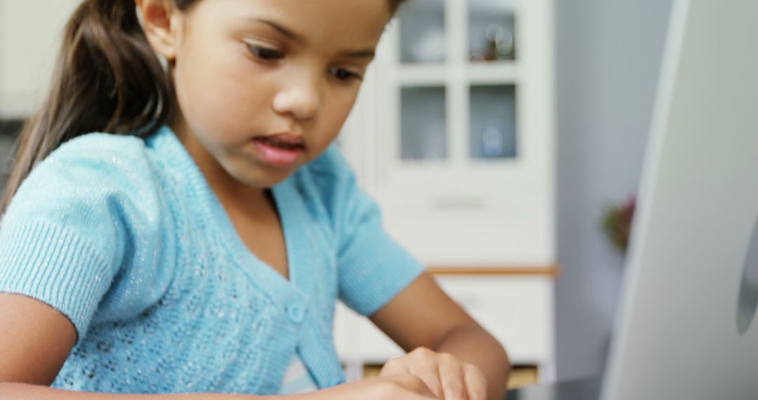 Young Girl Using Laptop for Online Learning at Home - Free Images, Stock Photos and Pictures on Pikwizard.com