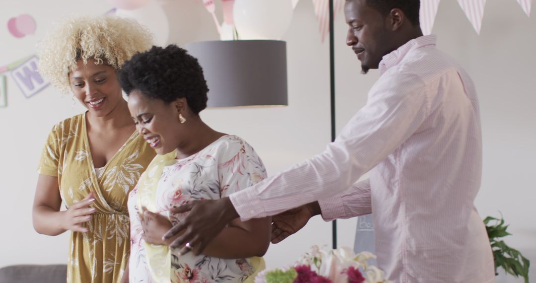 Joyful Home Celebration with Expecting Mother and Friends