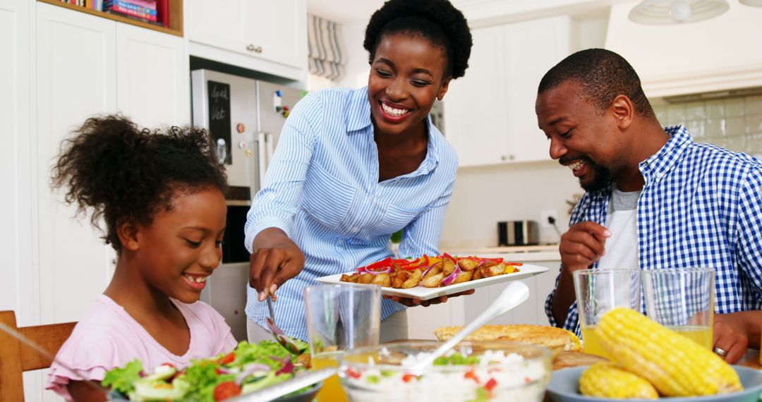 Smiling Family Sharing Dinner Enjoying Togetherness